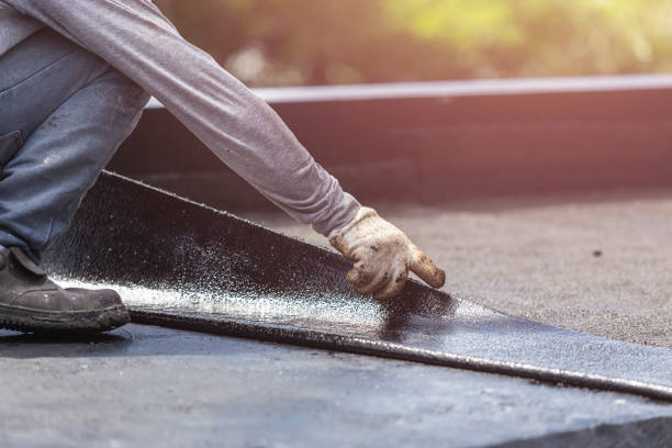 Professional Interior Drainage System technician working in Massapequa, NY
